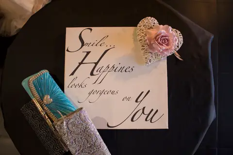 A decorative sign and a clutch bag displayed inside Heinz in Style.